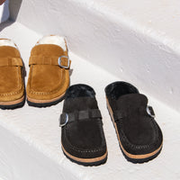 Group view of Birkenstock Buckle moc slip-on clog with soft genuine shearling lining.