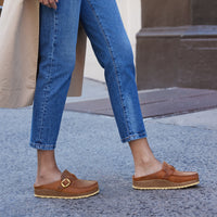 Casual outfit styled with the Women's Birkenstock Buckley in Cognac Oil Leather, featuring a cork-latex footbed and golden hardware