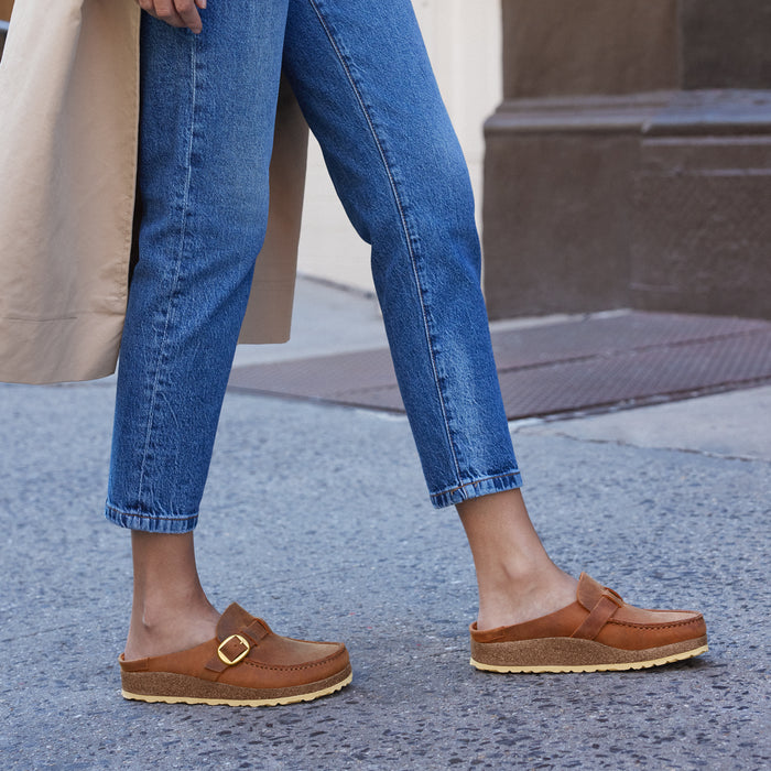 Casual outfit styled with the Women's Birkenstock Buckley in Cognac Oil Leather, featuring a cork-latex footbed and golden hardware