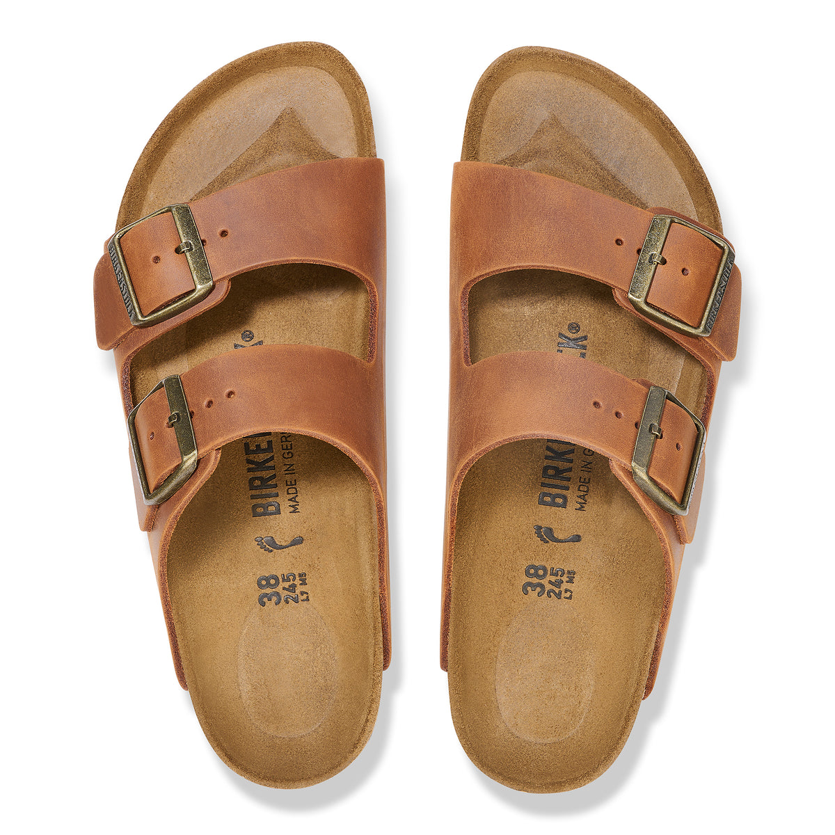 Overhead view of the classic Cognac brown oiled leather Arizona sandal by Birkenstock featuring original footbed and unique oiled finish.
