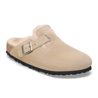 Angled profile of the Birkenstock Boston Shearling Clog in Taupe Suede, highlighting buckle detail and shearling footbed