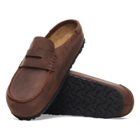 Pair of brown slip-on clogs on a white background
Birkenstock Naples Clog Wrapped in Habana Oiled Leather