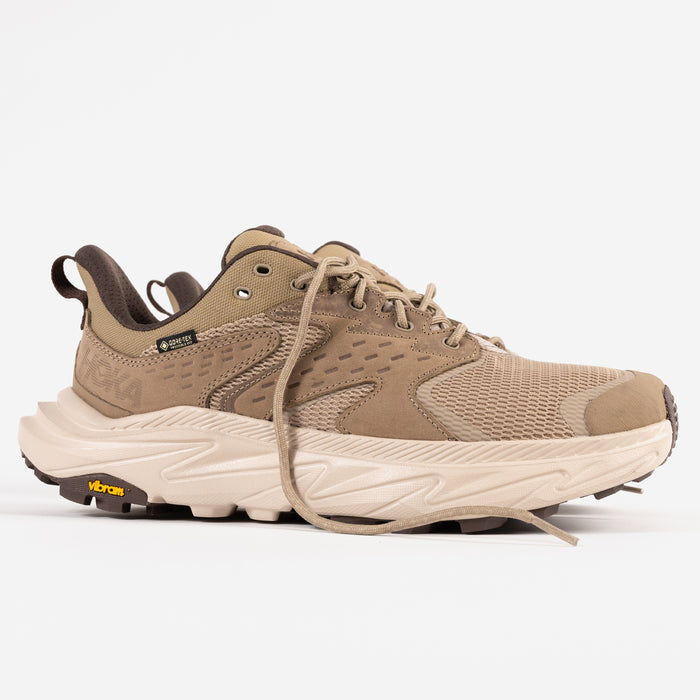 Side profile view of the Men's HOKA Anacapa 2 Low GTX Waterproof Hiking Shoe in Dune Nubuck Leather