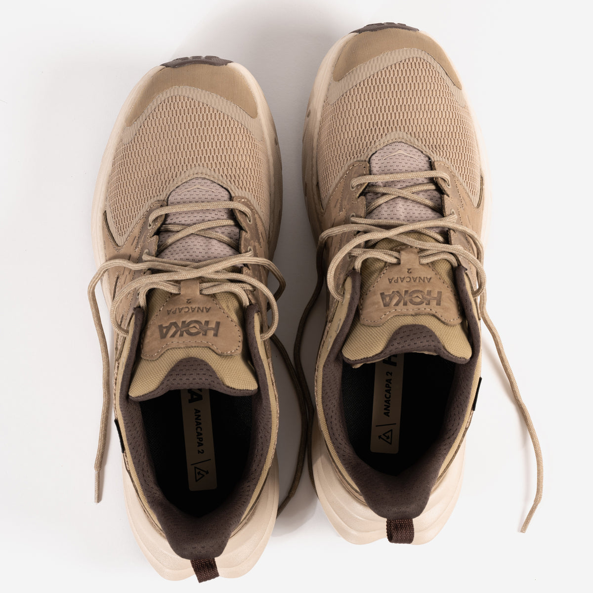 Overhead lace-up detail view of the Men's HOKA Anacapa 2 Low GTX Waterproof Hiking Shoe in Dune Nubuck Leather