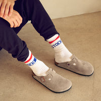 Birkenstock Boston Soft clog in Taupe Suede, featuring premium suede leather for all-day comfort. Classic slip-on style with soft footbed support, ideal for casual wear, gardening, or daily errands. Durable, lightweight, and built for long-lasting use, perfect for men and women seeking comfort and trendiness in footwear.