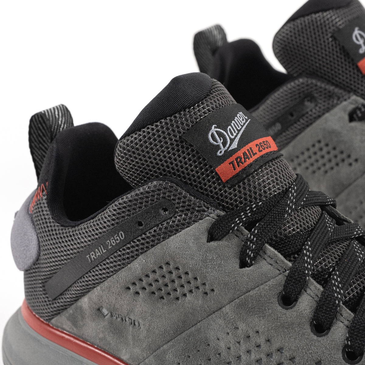 Danner logo patch detail on the Men's Danner Trail 2650 GTX Waterproof Hiking Shoe in Dark Gray Suede Leather