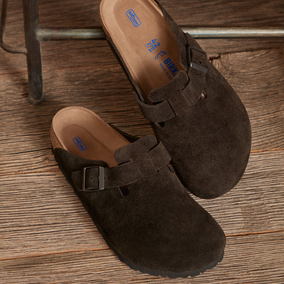 Birkenstock Boston Soft clog in Mocha Suede, featuring premium suede leather for all-day comfort. Classic slip-on style with soft footbed support, ideal for casual wear, gardening, or daily errands. Durable, lightweight, and built for long-lasting use, perfect for men and women seeking comfort and trendiness in footwear.