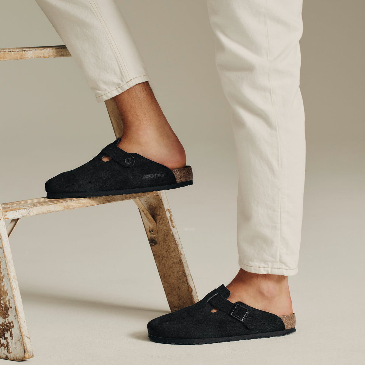 Birkenstock Boston Soft clog in Black Suede, featuring premium suede leather for all-day comfort. Classic slip-on style with soft footbed support, ideal for casual wear, gardening, or daily errands. Durable, lightweight, and built for long-lasting use, perfect for men and women seeking comfort and trendiness in footwear.