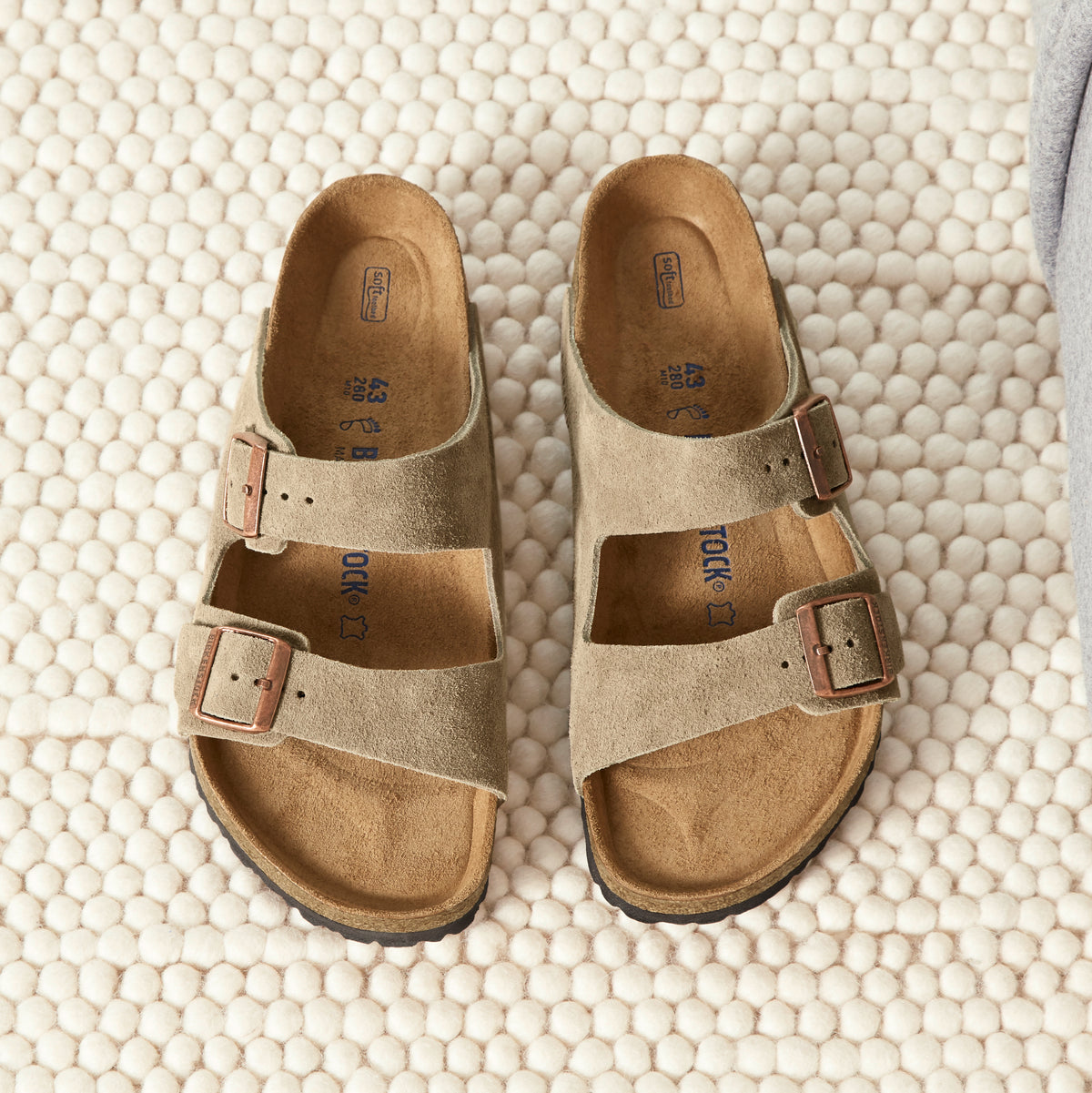 Overhead image of Birkenstock Arizona sandal in Taupe suede with adjustable straps and soft footbed