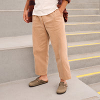 Lifestyle shot of male wearing the Birkenstock Boston Clog in Tobacco Oiled Leather a unisex slip on style
