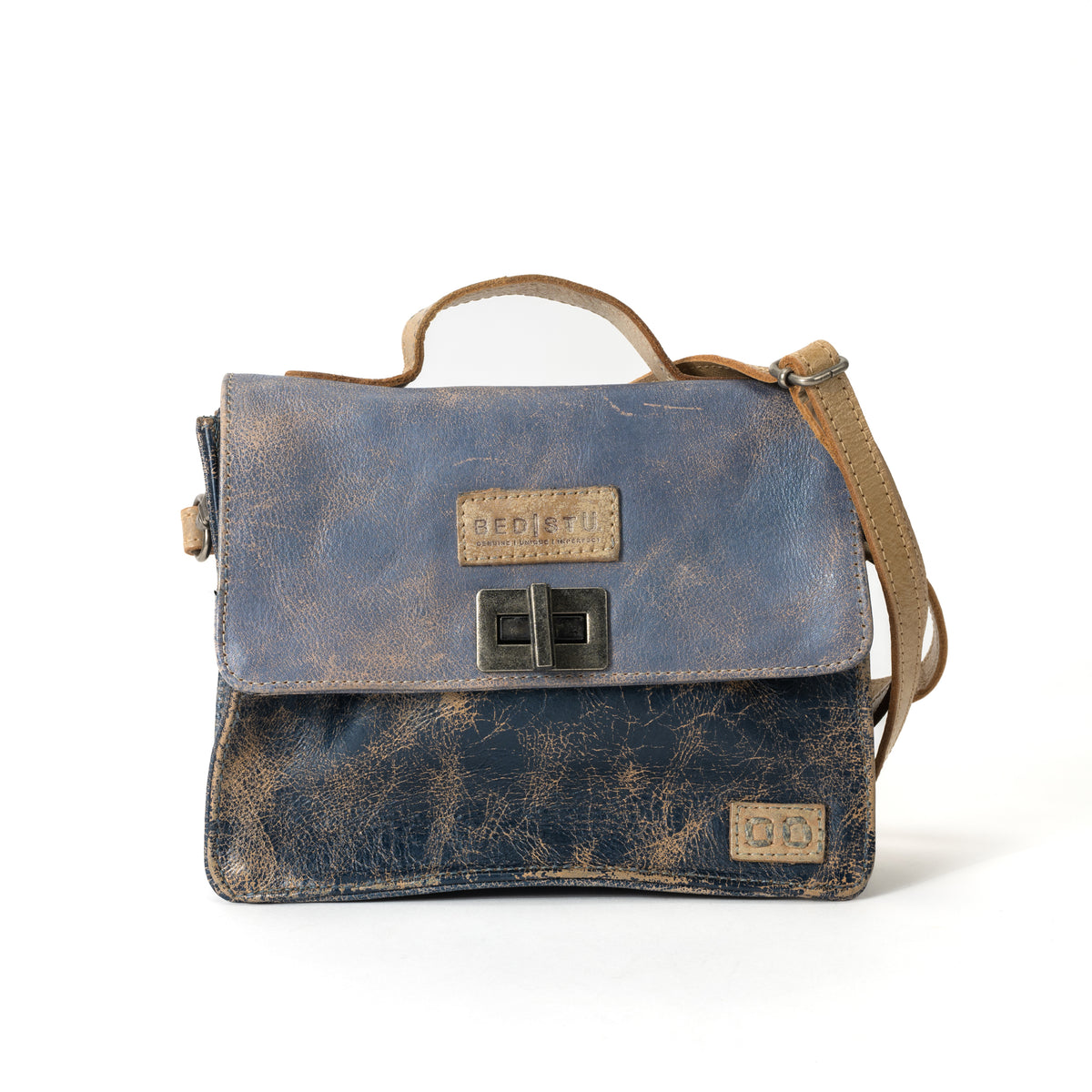 Front view of the BED|STU Improv Handbag in vegetable-tanned leather, showcasing its compact rectangular shape and stylish design.
