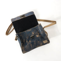 Inside view of the BED|STU Improv Handbag, featuring organic cotton lining and a slip pocket for organization.