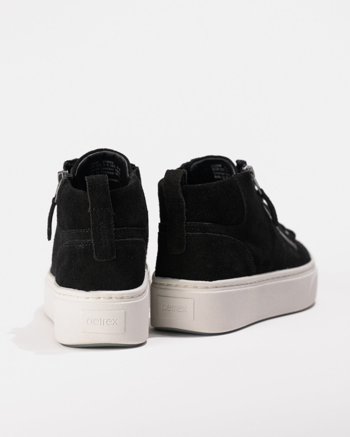 Heel view of the Women's Aetrex Gianna Arch Support Platform Sneaker in Black Suede Leather