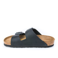 Anatomically correct footbed and arch support on the Birkenstock Arizona Sandal in Black Oil Leather, unisex sizing.