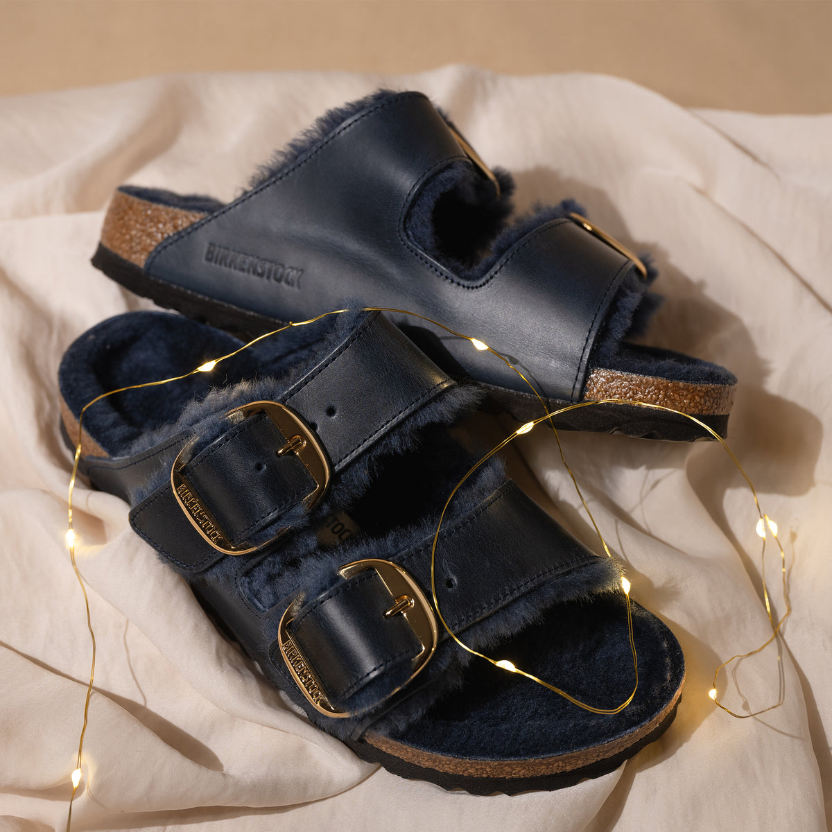 Big Buckle detail view of the Women's Birkenstock Arizona Big Buckle Sandal in Midnight Oiled Leather with Soft Genuine Shearling Lining