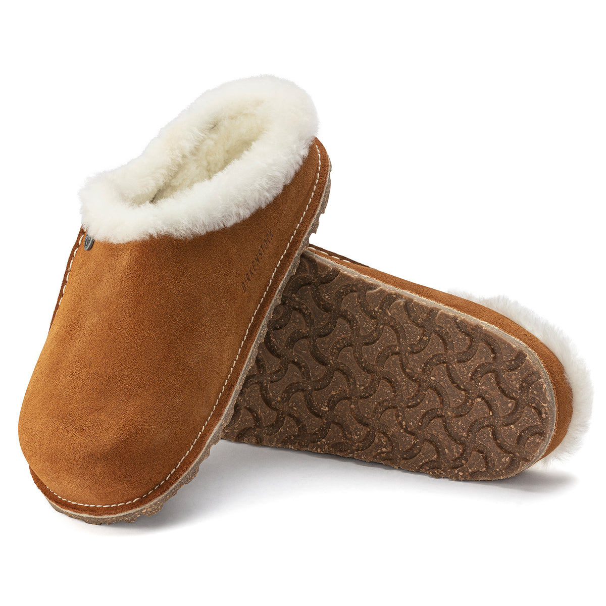 Side and bottom detail of Birkenstock Zermatt slipper, highlighting the durable rubber outsole and debossed logo detail