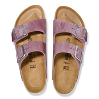 Top view of the Birkenstock Arizona Sandal in Lavender Oiled Leather, highlighting the contoured cork-latex footbed and timeless craftsmanship.