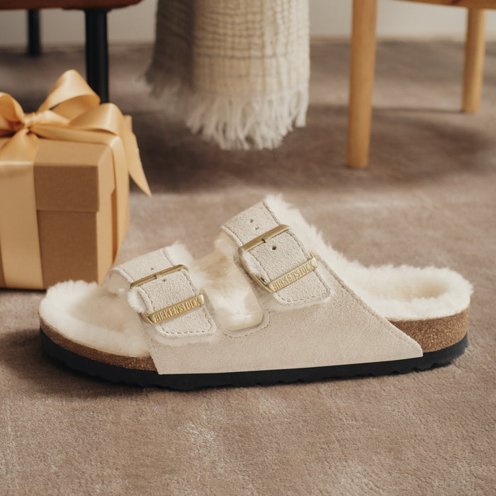 The Birkenstock Arizona Shearling sandal is the perfect cozy gift for women this holiday. Best gifts for women.