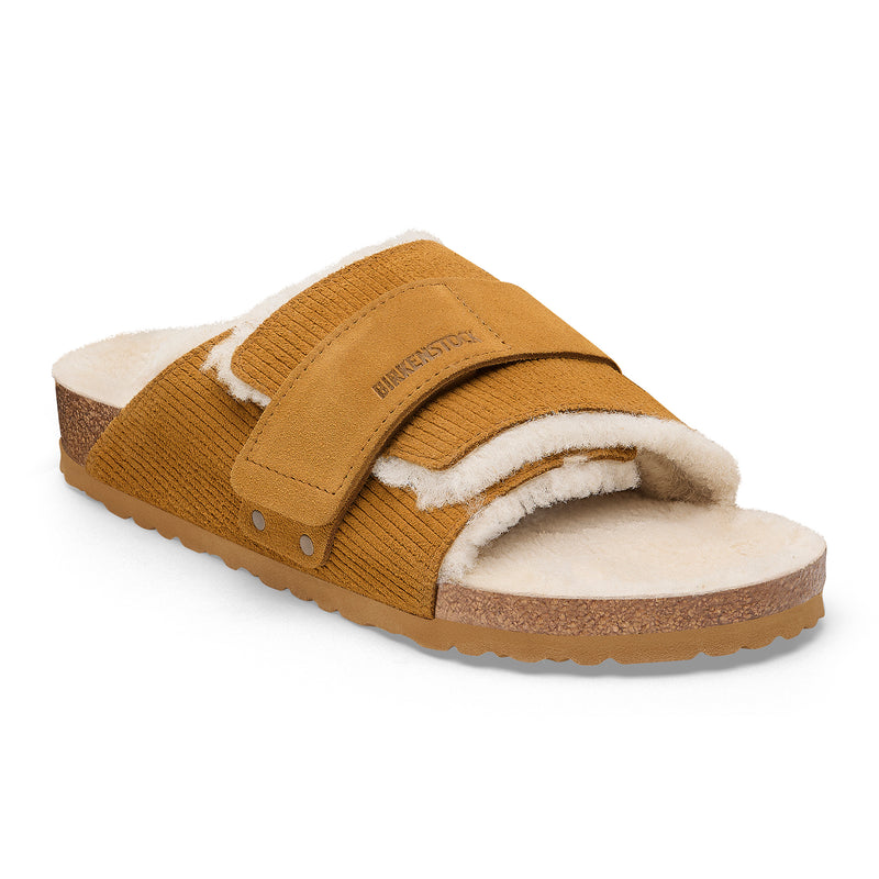 Front detail of the cork latex BIRKENSTOCK footbed with genuine shearling lining on the cozy Birkenstock Kyoto Shearling in Brown Suede Leather