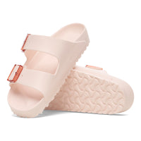 Profile and outsole view of the Arizona EVA in Light Rose with Stealth translucent buckles. A new style for 2025, great for water activities or post-workout comfort.