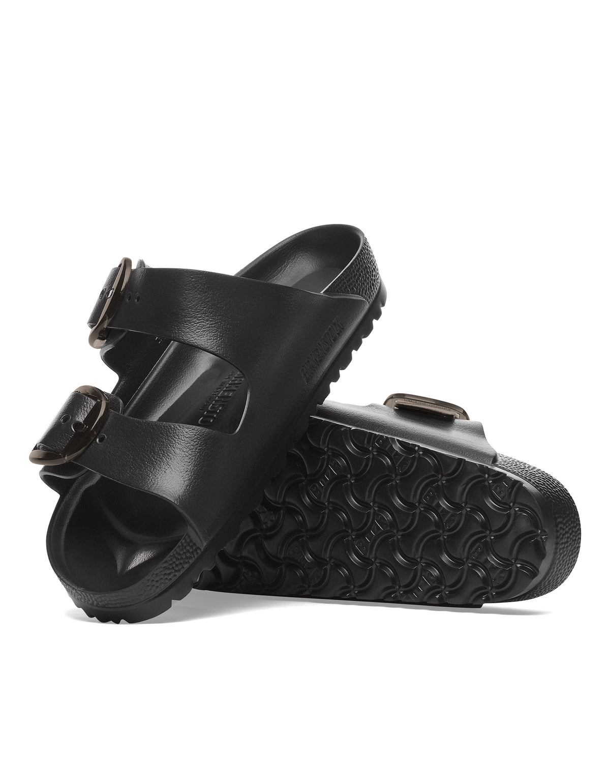 Product photo of a pair of Birkenstock EVA Big Buckle Arizona Stealth sandals isolated on white