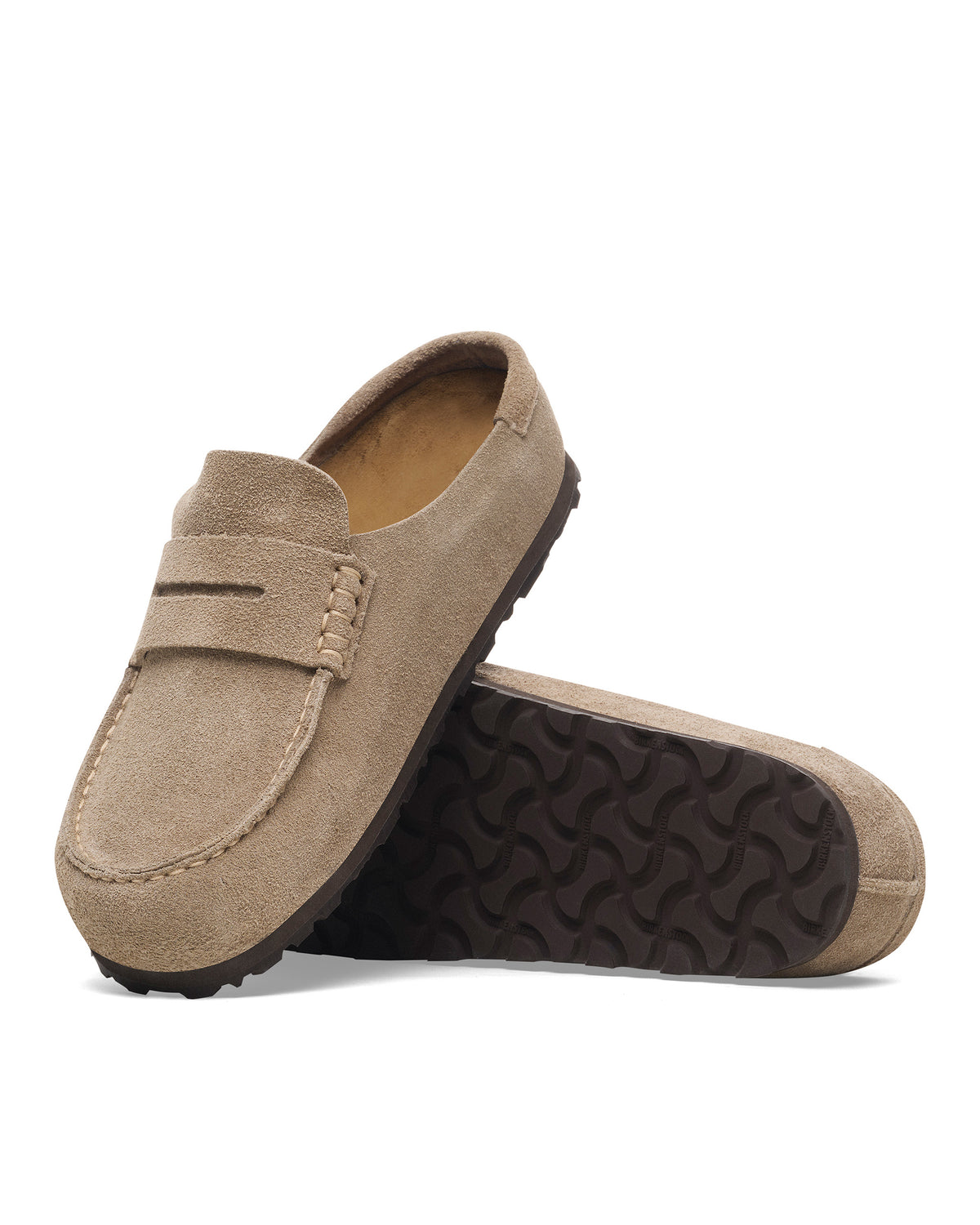 Pair of Birkenstock Naples Wrapped Clogs in Taupe Suede on a white background