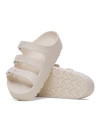 Birkenstock EVA Florida Flex Platform Sandals in Eggshell with a textured sole on a white background