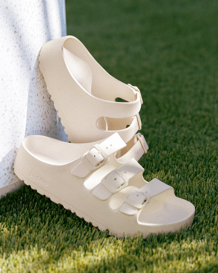 Birkenstock EVA Florida Flex Platform Sandal in Eggshell platform sandals on grass