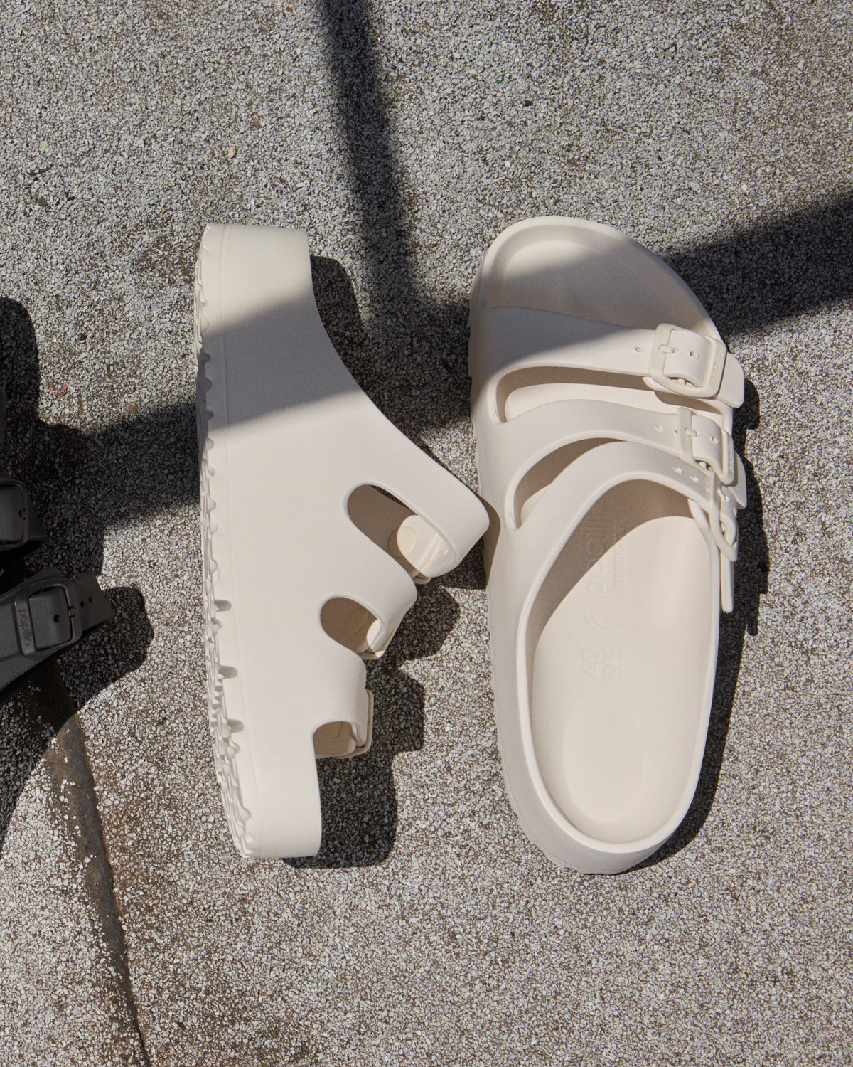 Birkenstock EVA Florida Flex Platform Sandal in Eggshell on a textured surface