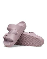 Birkenstock EVA Arizona Faded Purple two-strap water-ready sandals on a white background