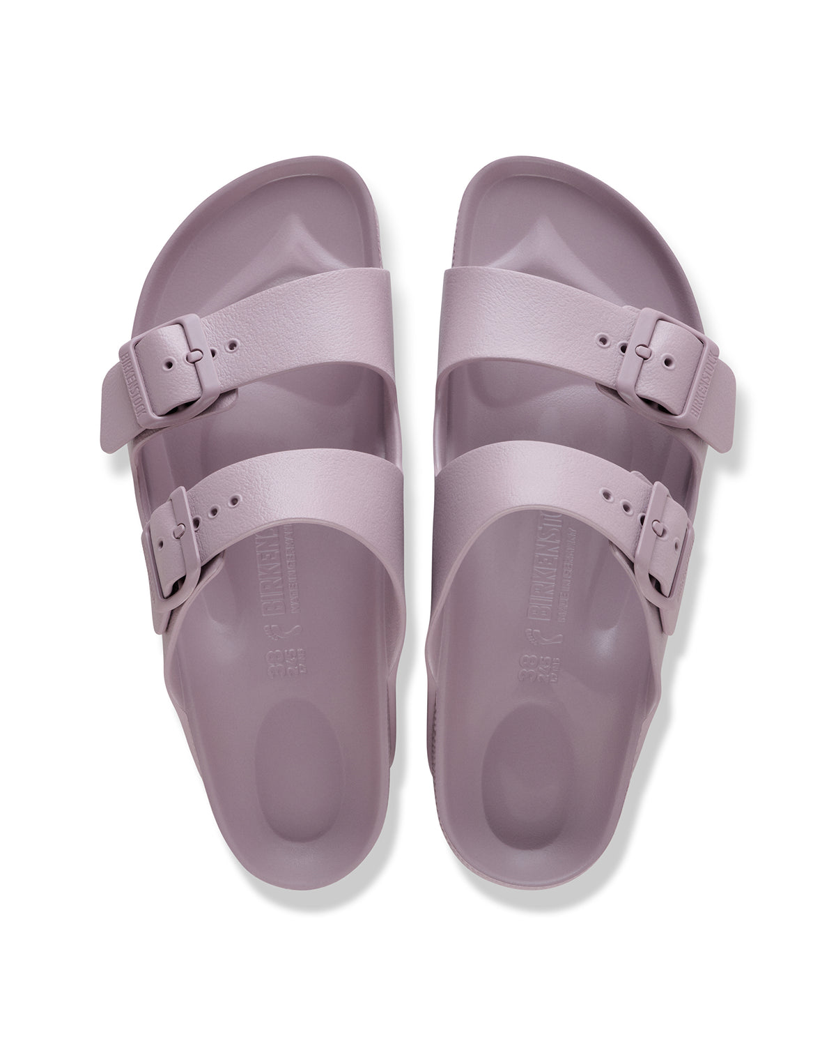 Pair of Birkenstock EVA Arizona Faded Purple two-strap water-ready sandals on a white background