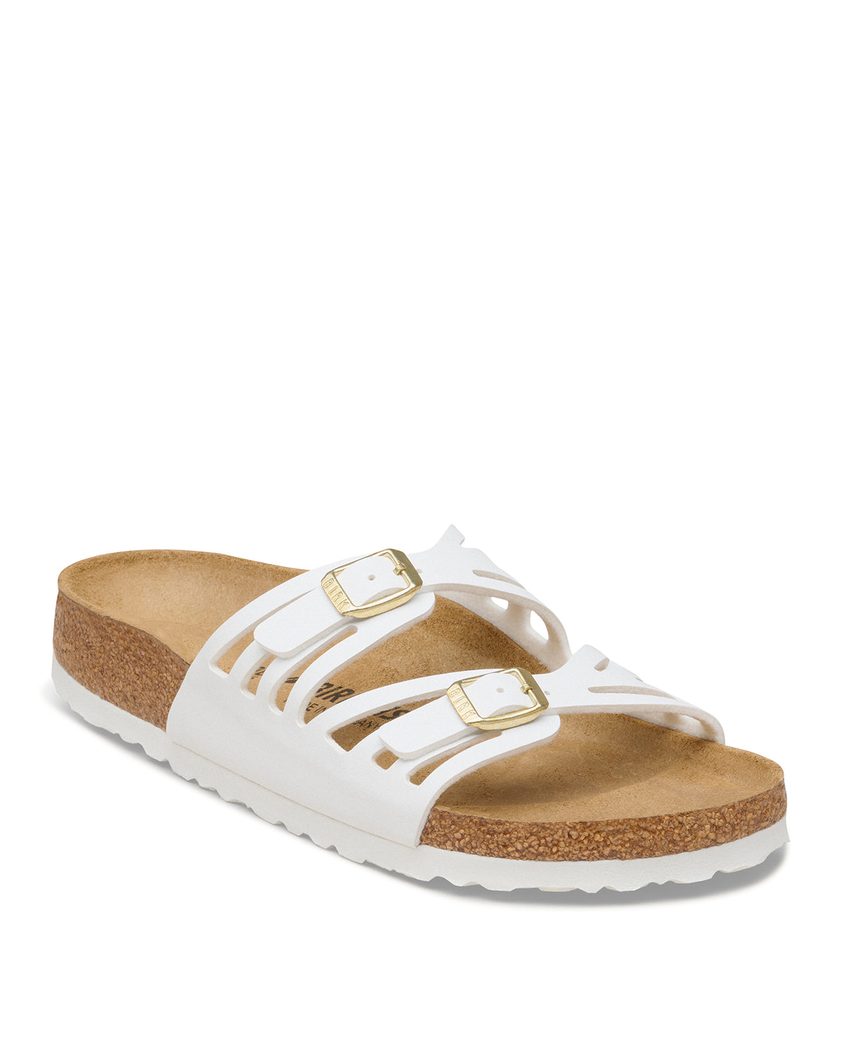 For those who like the classic Birkenstock feel but want something a bit more decorative, the Granada is the perfect middle ground. It features a unique double-strap design with laser-cut detailing that gives it a lighter, more airy appearance than the chunkier traditional models. It’s a great way to get that signature supportive feel in a silhouette that looks right at home with summer dresses and skirts. Shown in White synthetic Birko-Flor.