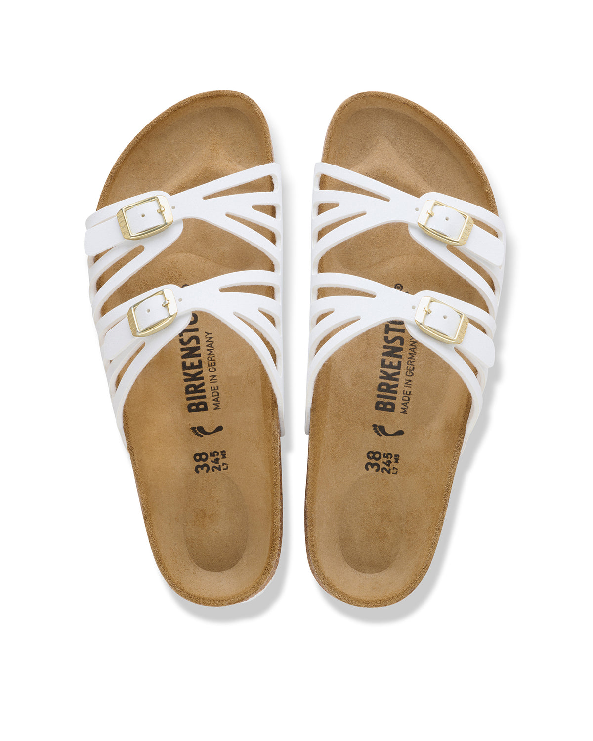 For those who like the classic Birkenstock feel but want something a bit more decorative, the Granada is the perfect middle ground. It features a unique double-strap design with laser-cut detailing that gives it a lighter, more airy appearance than the chunkier traditional models. It’s a great way to get that signature supportive feel in a silhouette that looks right at home with summer dresses and skirts. Shown in White synthetic Birko-Flor.