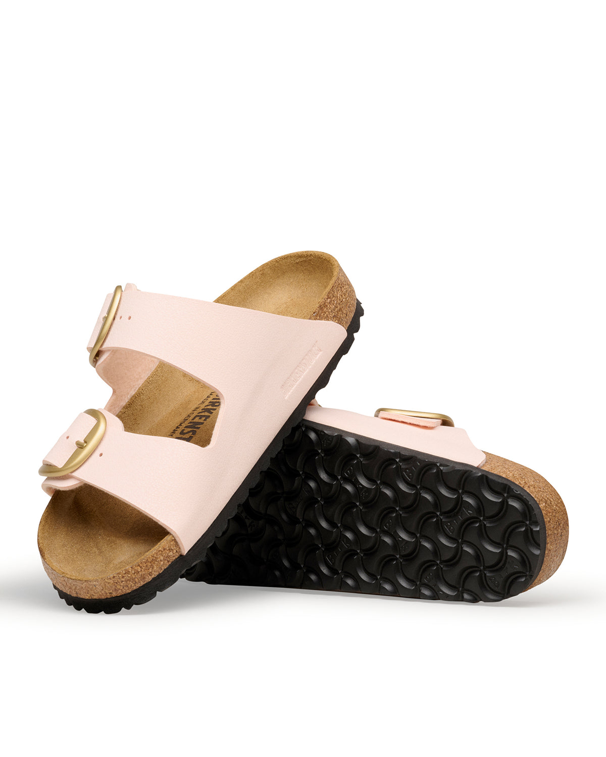 The Birkenstock Arizona Big Buckle in Light Rose Birkibuc bridges the gap between high-fashion aesthetics and everyday durability. This edition updates the legendary two-strap sandal with an amplified, oversized metal buckle that acts as a striking centerpiece. The upper is crafted from light pink-colored Birkibuc, a skin-friendly, durable synthetic material that perfectly mimics the soft texture and matte finish of nubuck leather.