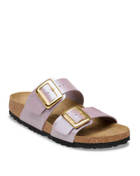 Birkenstock Sydney Luxe Buckle sandal with gold buckle and light purple straps on a white background