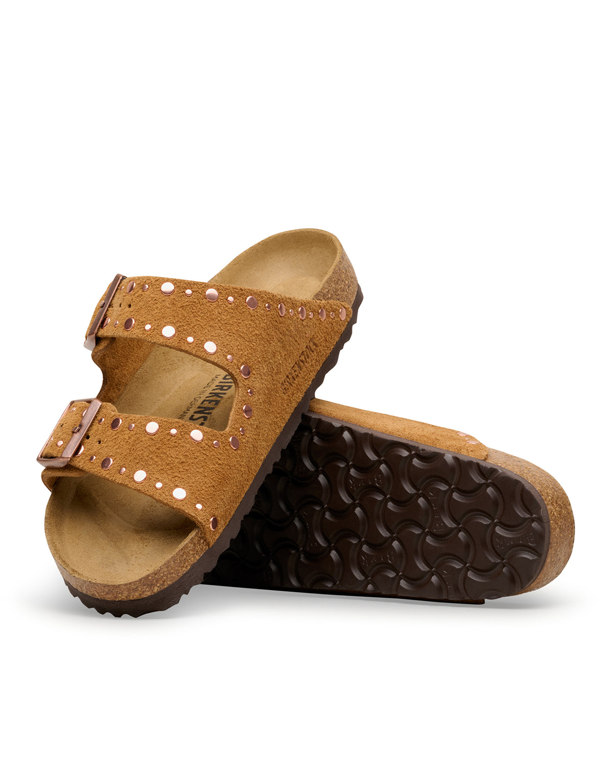 Mink brown riveted suede sandal with a textured sole on a white background