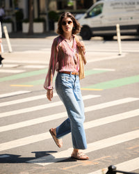 The Birkenstock Granada offers a refined, natural aesthetic for those who appreciate the support of a classic slide but want a more detailed look. This version is upgraded with premium nubuck leather, which is gently buffed to create a soft, velvety texture that feels luxurious from the first wear. The twin-strap design features elegant laser-cut perforations, providing a light and airy feel that transitions perfectly from a casual day out to a more put-together summer evening.