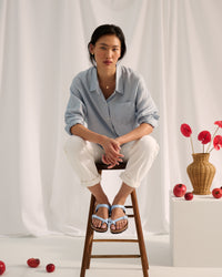 Birkenstock Mayari Birko-Flor Toe-Loop Sandals in Baby Blue

The Birkenstock Mayari is a favorite for those who want a more streamlined, secure feel without the heavy look of a traditional slide. This version features a unique crisscross design and a dedicated toe loop that keeps the sandal perfectly in place while you walk. This feminine crisscross style transitions easily from a morning at the farmer's market to a casual outdoor dinner.