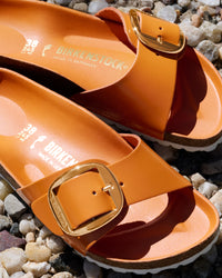 Birkenstock Madrid Big Buckle Slide Sandal in Kurkuma Orange Natural High-Shine Patent Leather, 1031881
