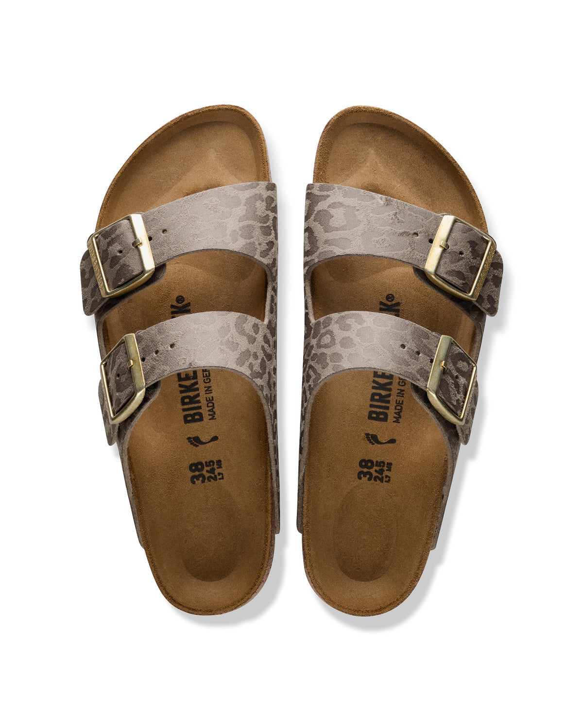 The Birkenstock Arizona Leopard Print Sandal in Birko-Flor brings a fierce, fashion-forward twist to the iconic style. This edition wraps the legendary two-strap silhouette in a bold, untamed animal print that serves as a neutral for any wardrobe. The upper is crafted from synthetic textured Birko-Flor, a skin-friendly and tear-resistant synthetic material that offers a sleek, leather-like finish. 