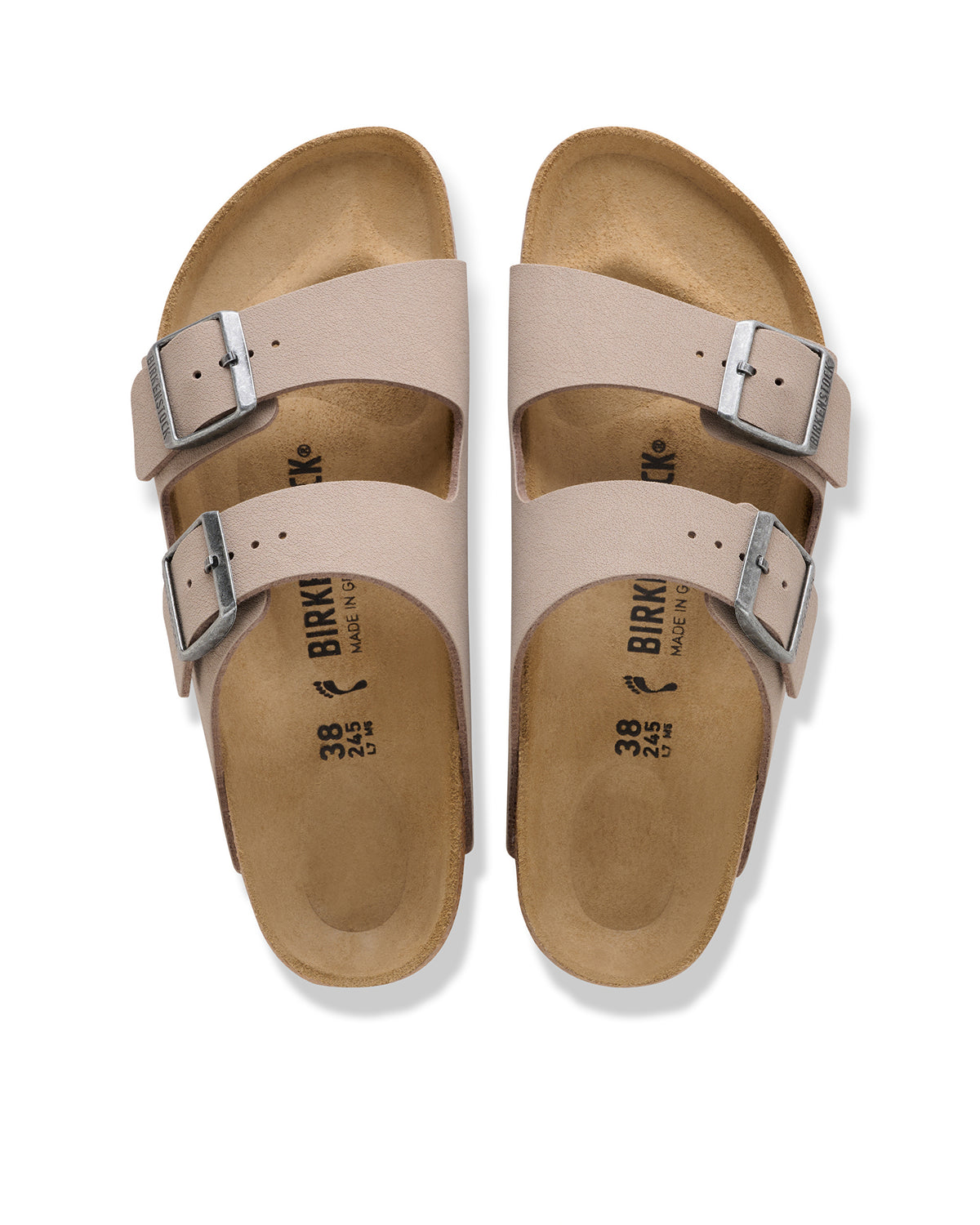 The Birkenstock Arizona is essentially the gold standard for slides, and this Birkibuc version is the practical answer for anyone who wants a rugged, low-maintenance look. Instead of traditional leather, these are crafted from a signature Birkenstock material called Birkibuc—a heavy-duty synthetic with a brushed finish that mimics the texture of real nubuck. It’s tough, easy to wipe down, and holds its shape through seasons of wear.