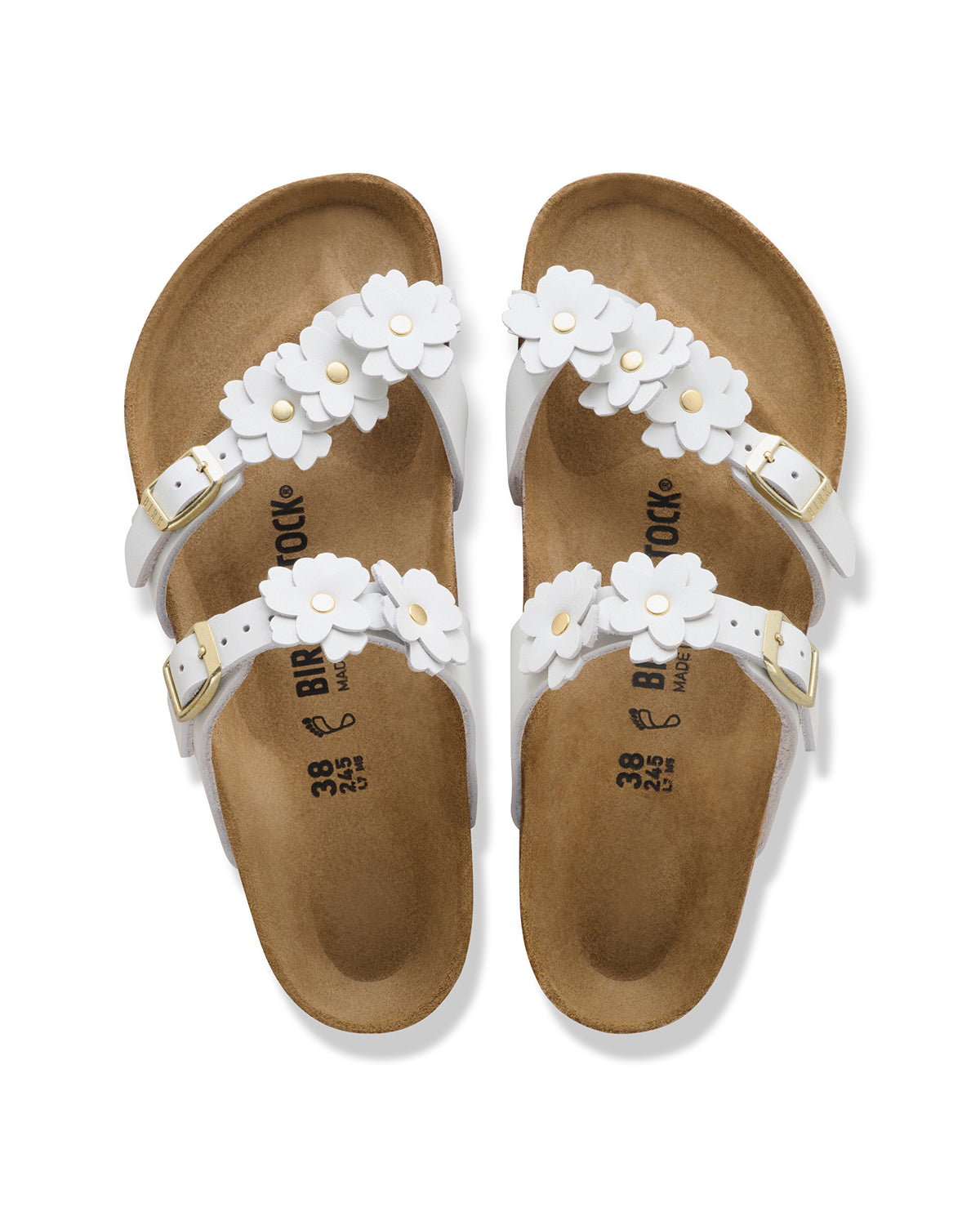 The Mayari Flowers takes that classic, secure toe-loop design we all love and dresses it up with sweet leather floral appliqués.&nbsp;A slightly more "feminine" take on the utility look, making it easy to pair with sundresses or cropped denim without feeling too sporty.