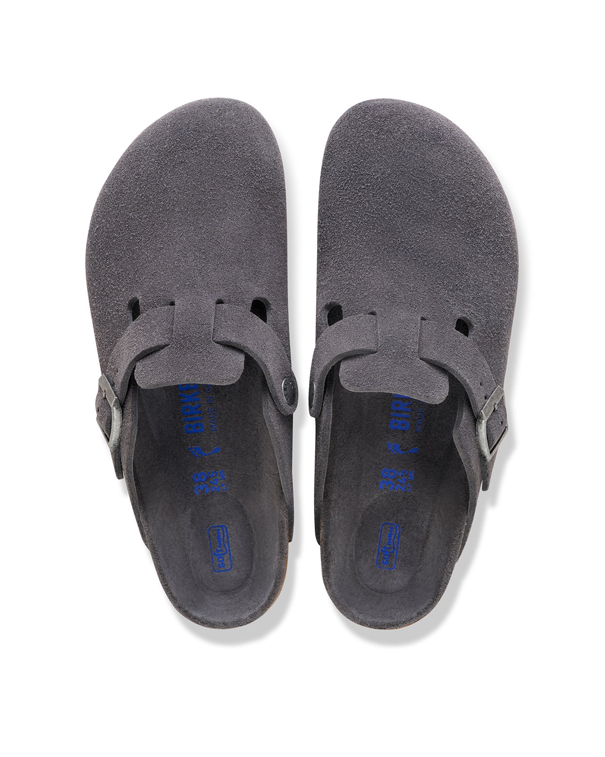 Birkenstock Boston Soft Footbed Suede Leather Clog in Charcoal

The Birkenstock Boston Clog has transitioned from a lounge staple to a street-style icon, and this version offers the most "broken-in" feel right out of the box. Crafted from premium, velvety suede, the upper has a soft, flexible drape that conforms comfortably to the foot. The standout feature is the integrated latex foam layer tucked inside the signature cork footbed. 