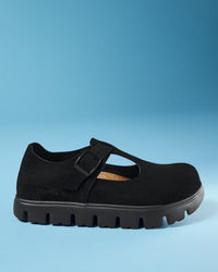 A Birkenstock Paris Chunky Mary Jane Platform in Black Suede Leather with a thick, textured lug sole, shown from a side profile against a solid blue background. The brand name 'papillio' is subtly printed in white on the heel area.