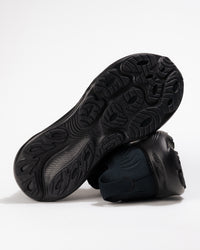 Outsole and heel stack view of Brooks Adrenaline GTS 25 Black – durable grip and stable base for road running