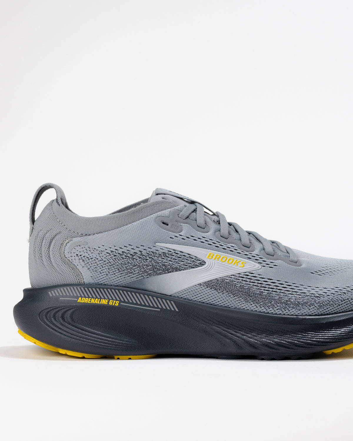 Close-up of Brooks Adrenaline GTS 25 logo and medial side detail – men’s stability running shoe in Primer Gray colorway