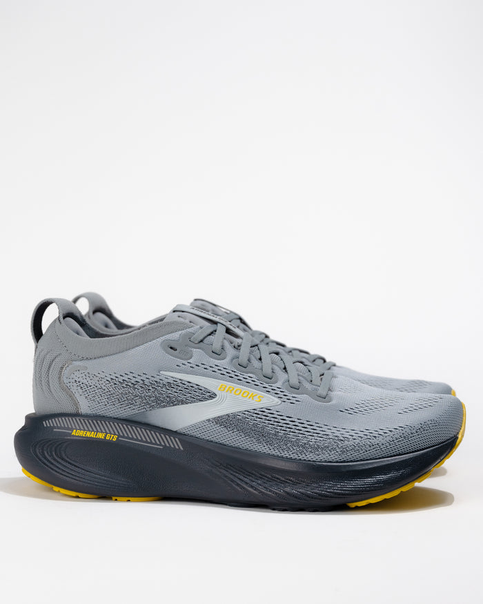 Men’s Brooks Adrenaline GTS 25 Primer Gray running shoe – angled side profile view showing GuideRails support and engineered mesh upper