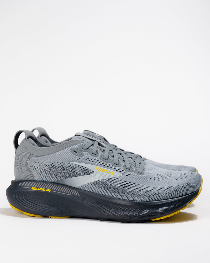 Men’s Brooks Adrenaline GTS 25 Primer Gray running shoe – angled side profile view showing GuideRails support and engineered mesh upper