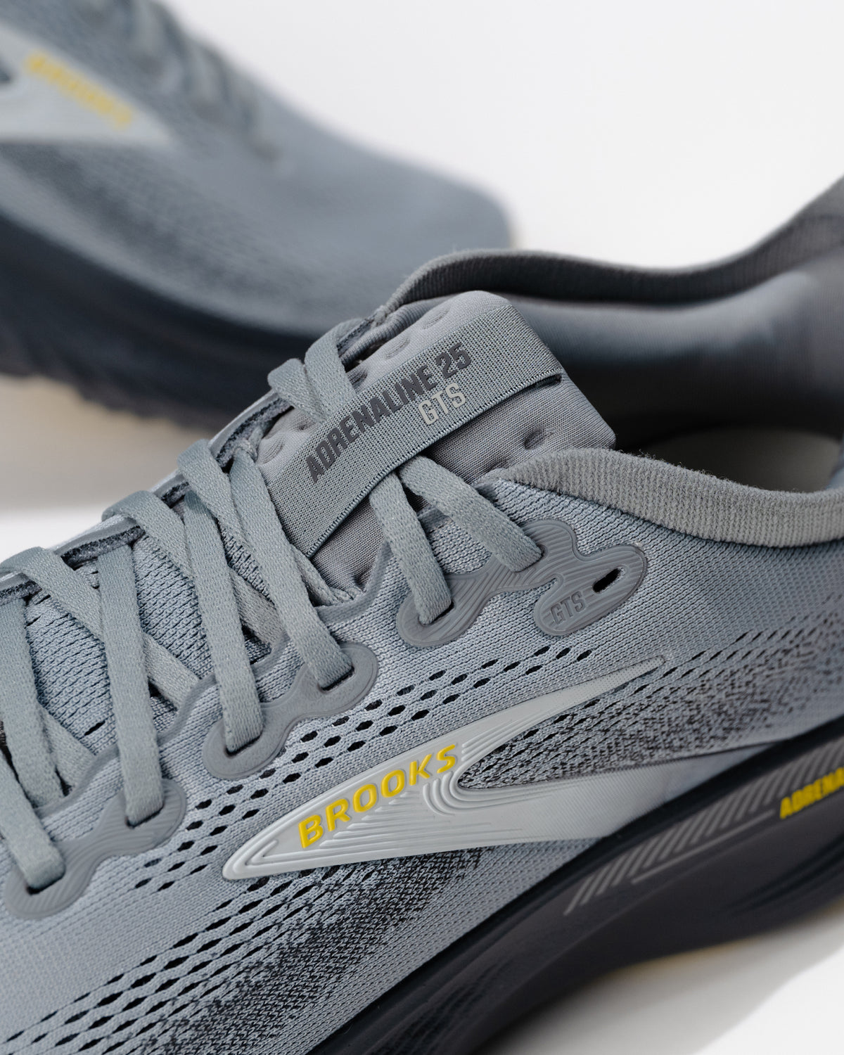 Close-up of Brooks Adrenaline GTS 25 logo and lacing detail