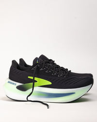 Side profile of men’s Brooks Glycerin Max 2 with plush, rocker midsole and engineered mesh upper in Phantom/Green
